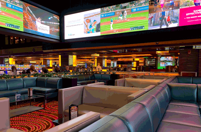 The VIP area and wrap-around video walls at the William Hill Sportsbook at Tropicana Atlantic City